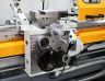 The heavy duty apron features a user friendly Single Lever Joystick which controls the feeds and <strong>4-way rapid traverse</strong> in all four directions.  Dials have inch and metric readings, and the compound comes standard with a T-Slot.